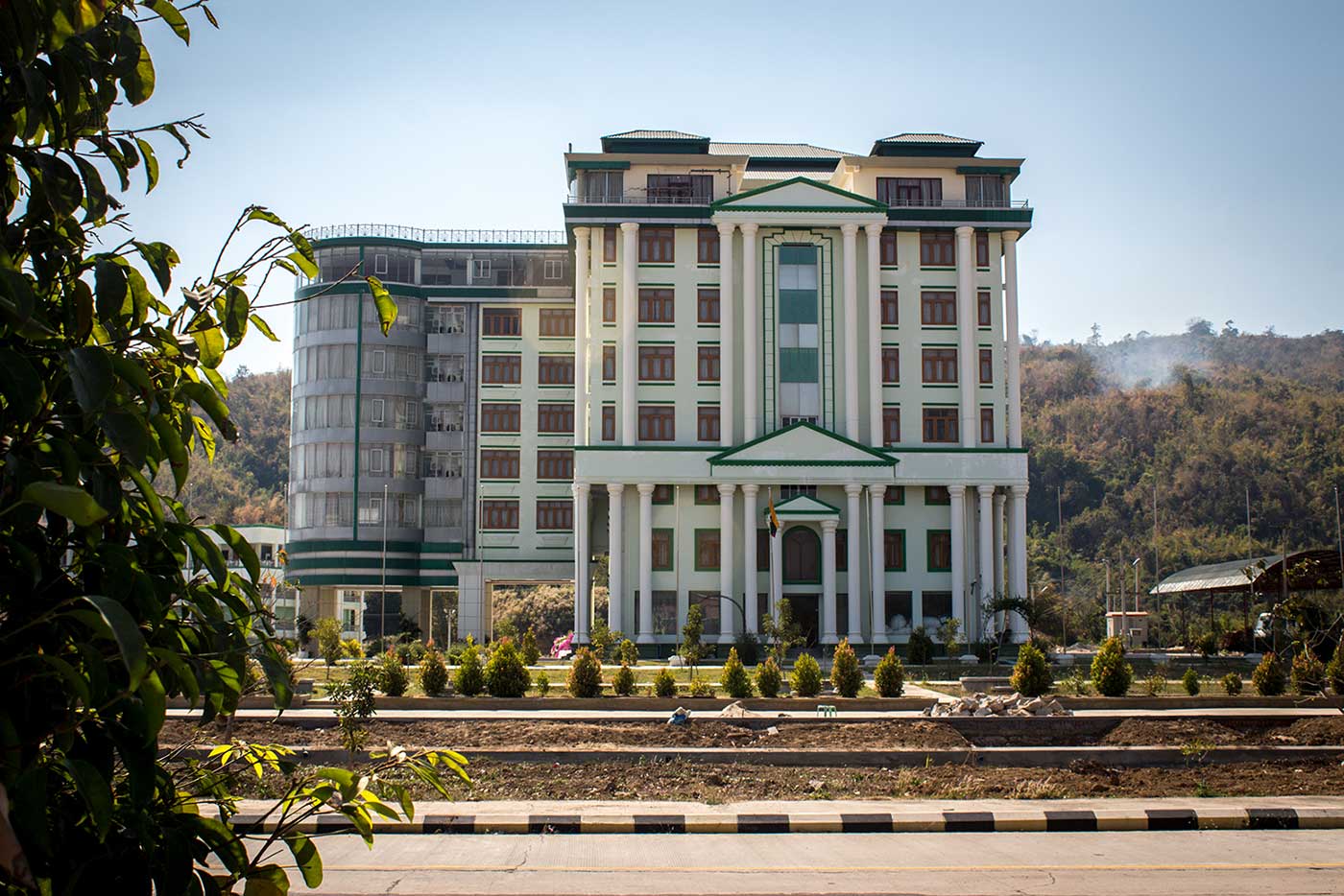 One of 60 unfinished hotels that line the grid-like streets of Hotel Zone 2. Naypyidaw, Myanmar.