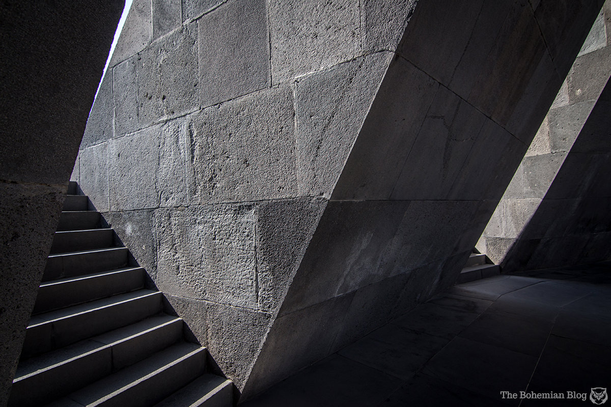 Harsh angles and sheer stone walls create an atmosphere of oppression inside the Armenian Genocide Memorial Complex.