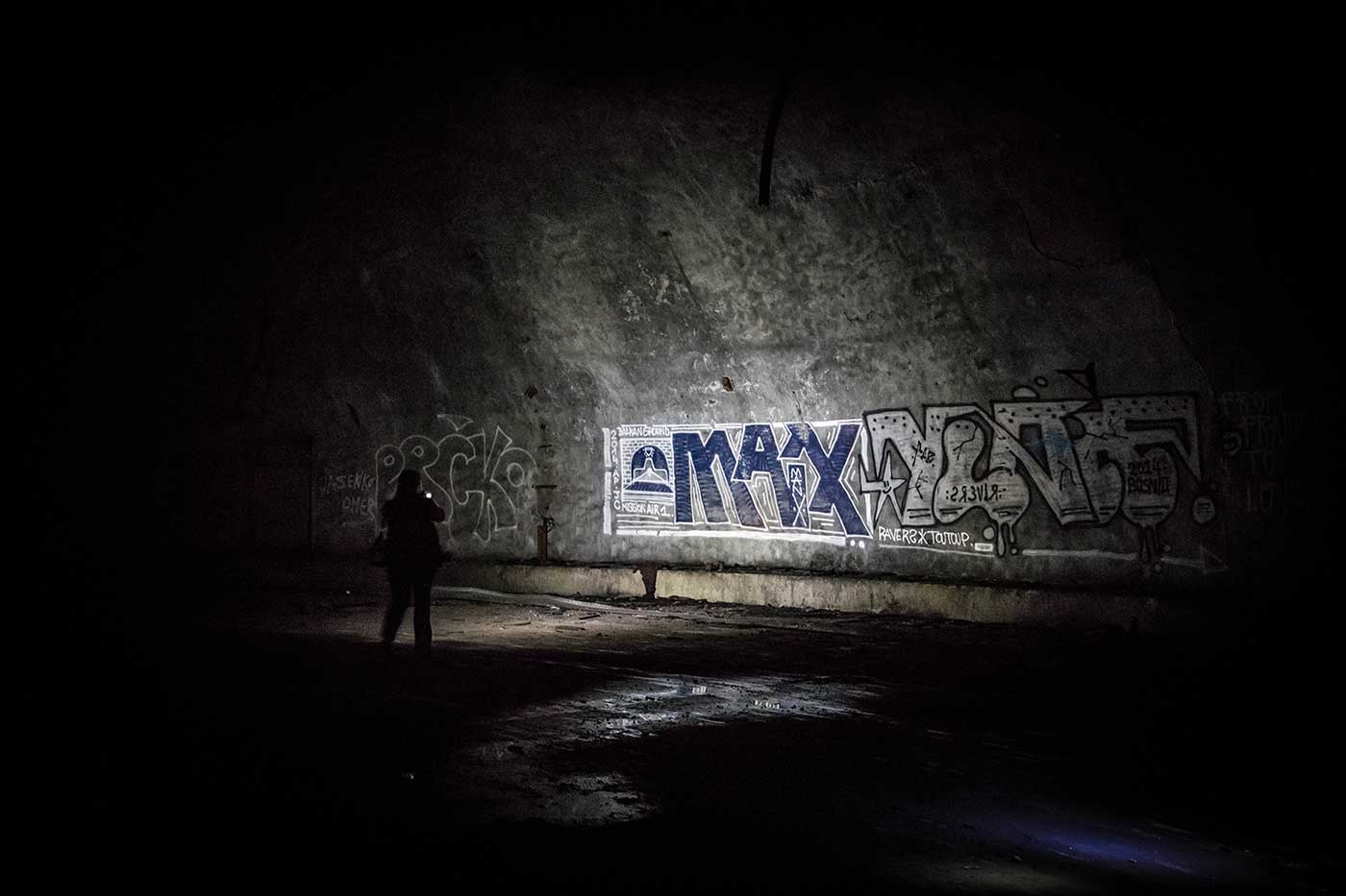 Graffiti inside the Željava complex. The deeper into the mountain you go, the less graffiti you find.