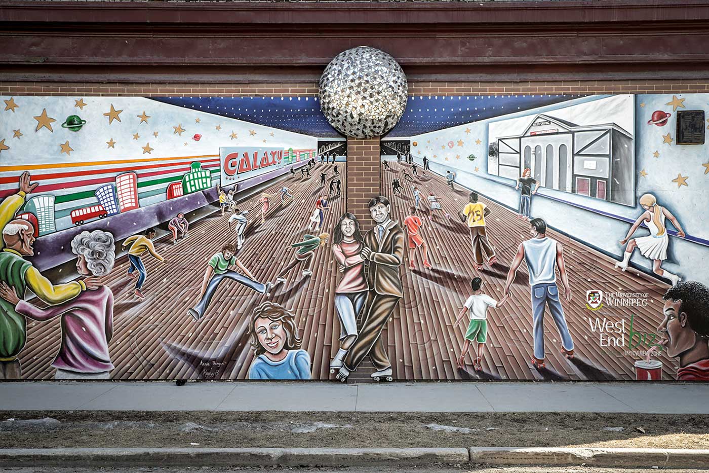 Remembering the Roller Rink – Mural on Portage Avenue, Winnipeg, painted by Annie Bergen and Marcus Bauer with mosaic disco ball by Ursula Neufeld. 2011. The mural pays tribute to the former Winnipeg Roller Rink, a popular social venue from the 1930s that stood here until its demolition in 2007.
