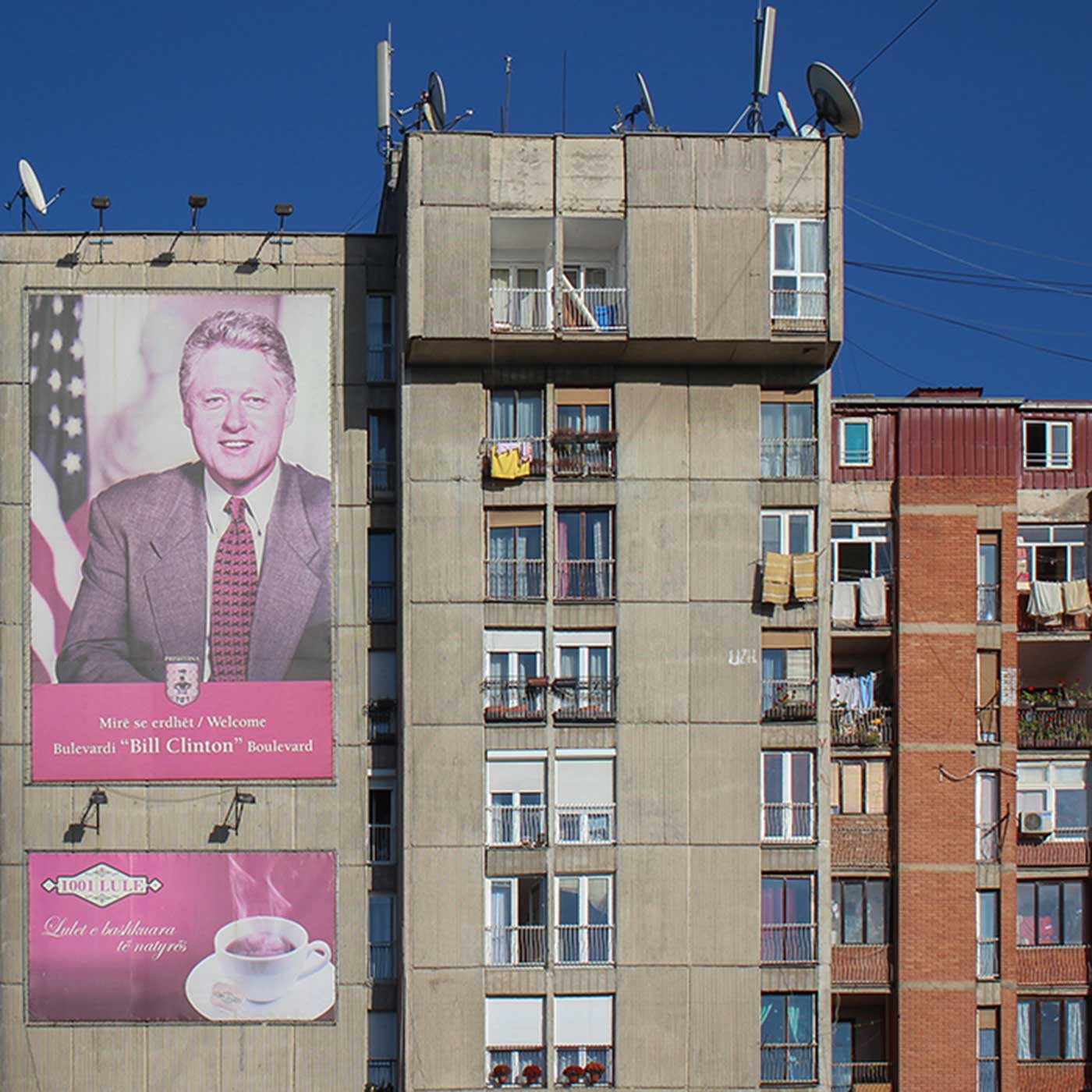 Poster of Bill Clinton on a residential block in Pristina, Kosovo.