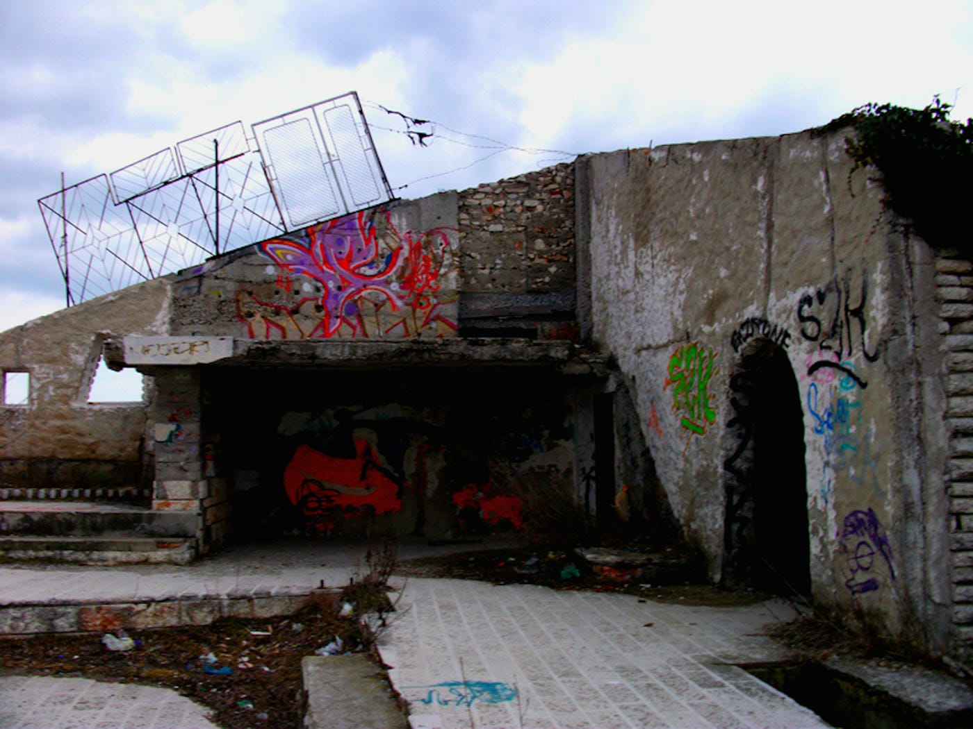 The fallen restaurant: exploring a ruin with a view on the edge of a cliff high above the Bulgarian Black Sea 