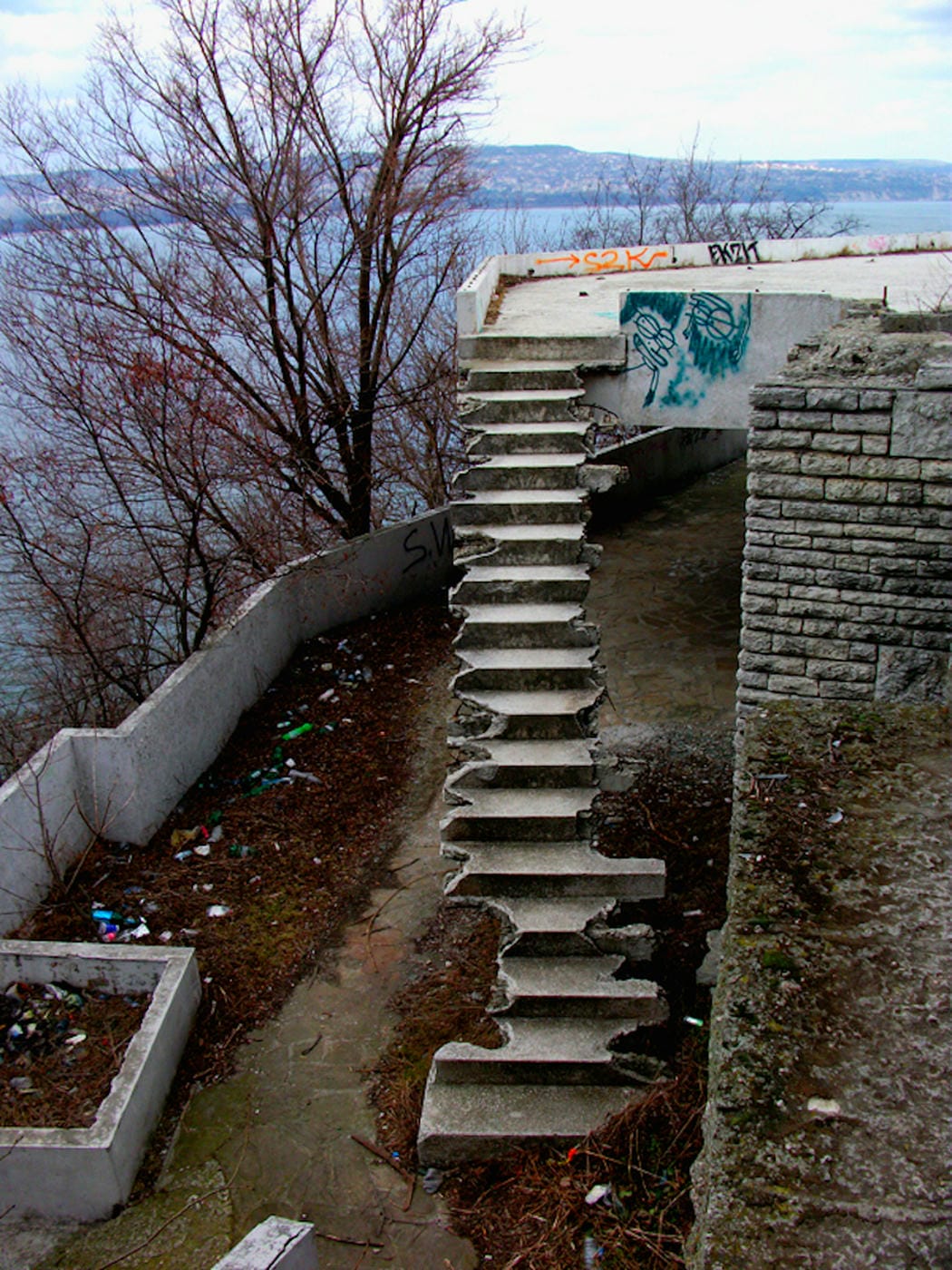 The fallen restaurant: exploring a ruin with a view on the edge of a cliff high above the Bulgarian Black Sea