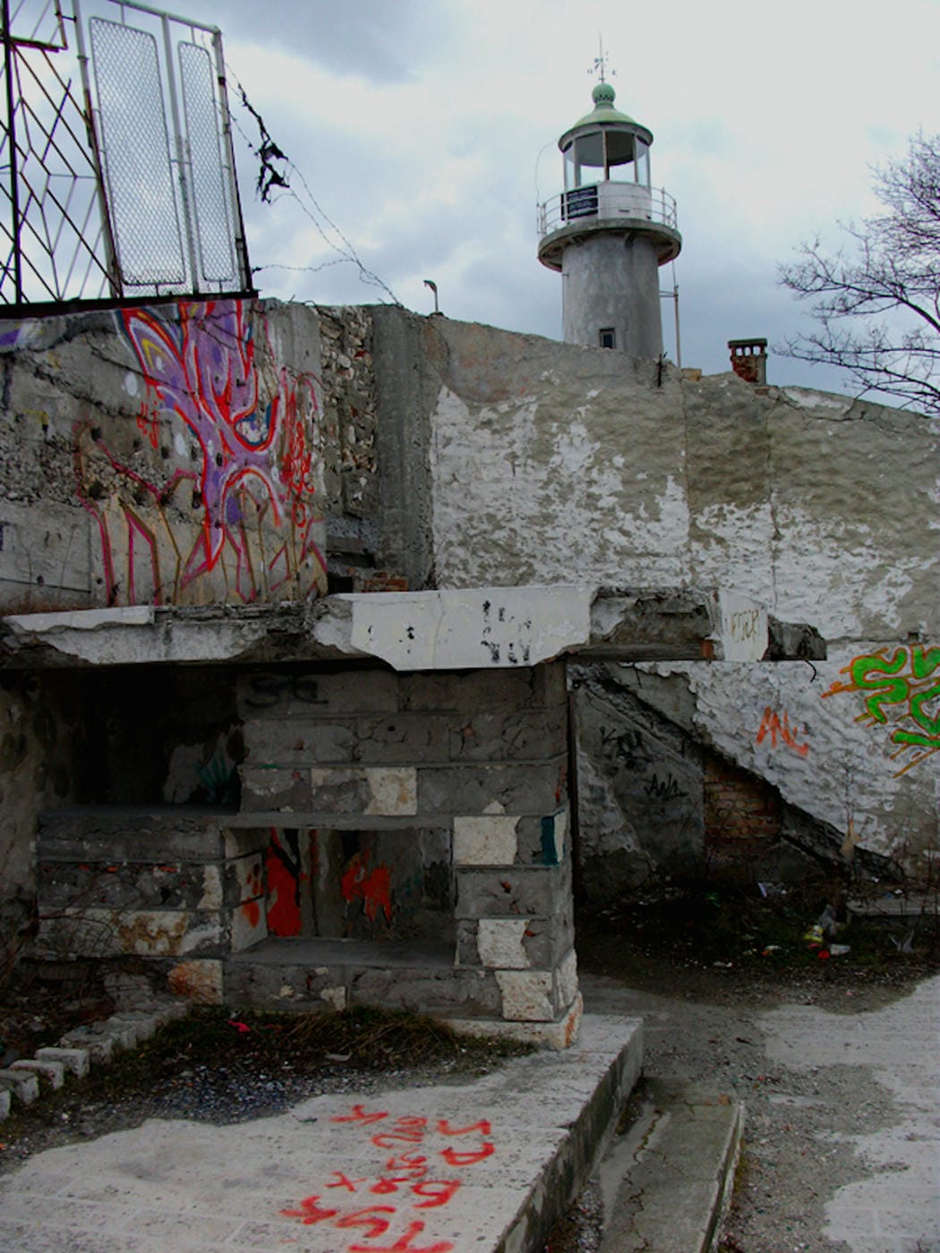 The fallen restaurant: exploring a ruin with a view on the edge of a cliff high above the Bulgarian Black Sea 