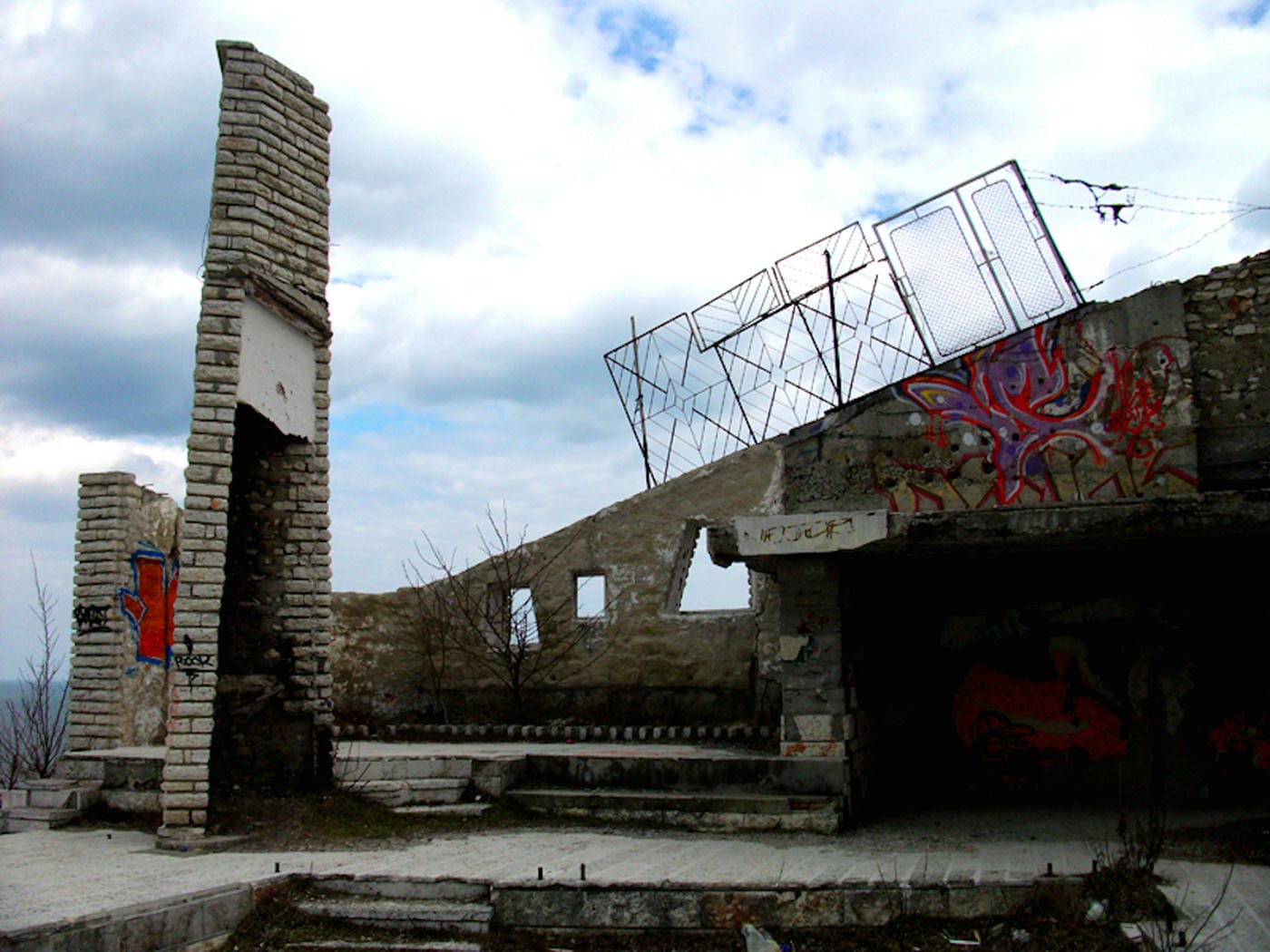 The fallen restaurant: exploring a ruin with a view on the edge of a cliff high above the Bulgarian Black Sea