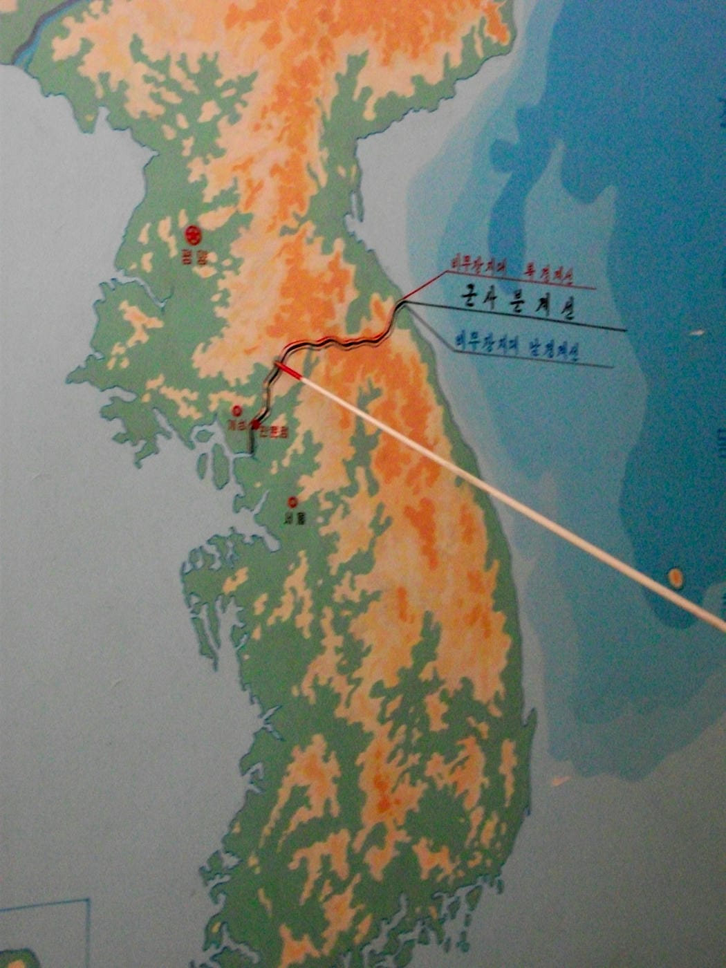 The Demilitarized Zone (or DMZ) dividing North Korea from South Korea